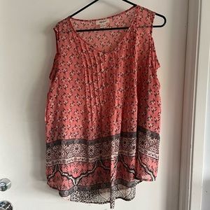 Light pink, short sleeve blouse by style and Co and is a woman’s size large